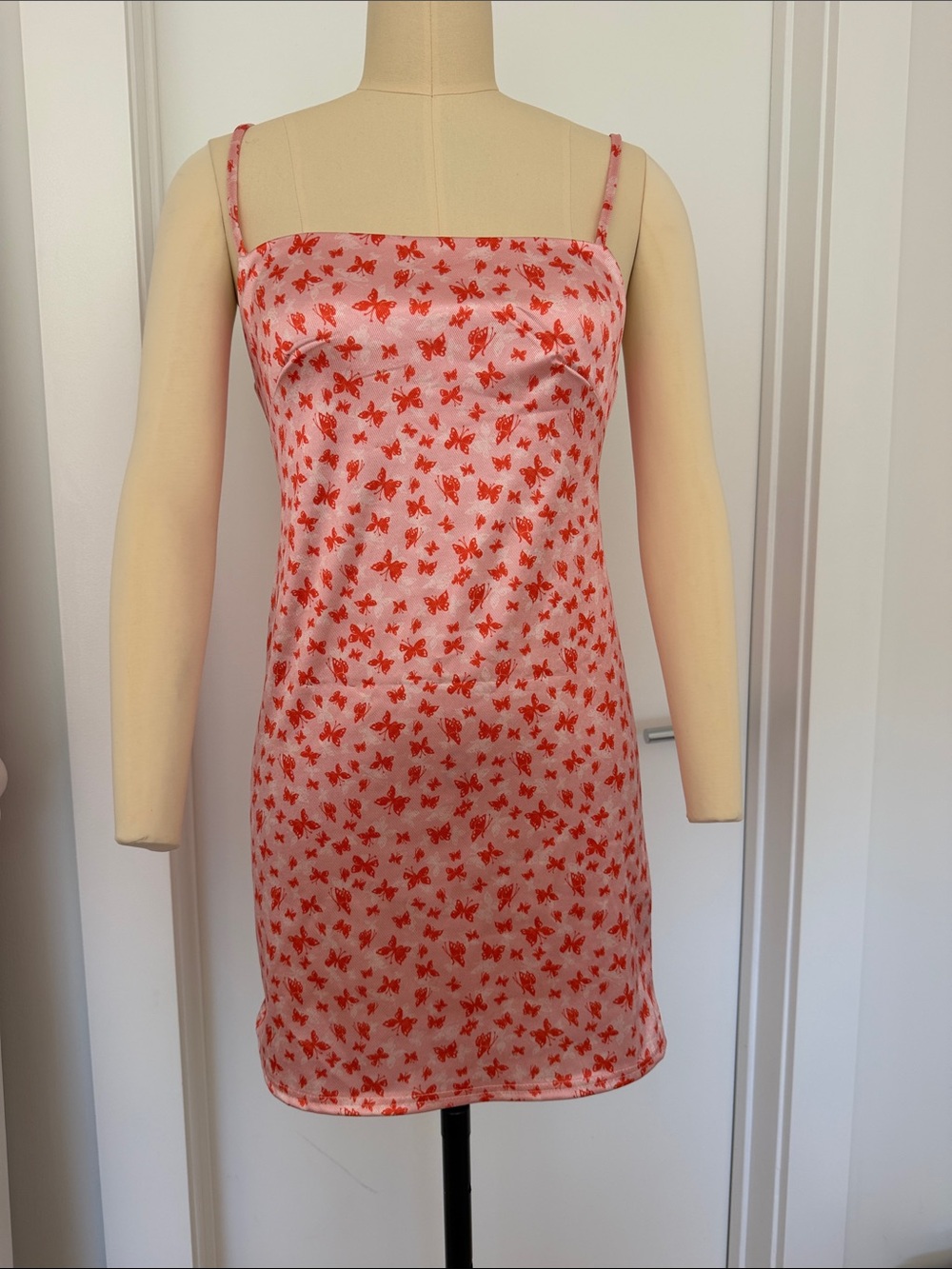 Urban Outfitters Pink Slip Dress with Red Butterfly Print runs small